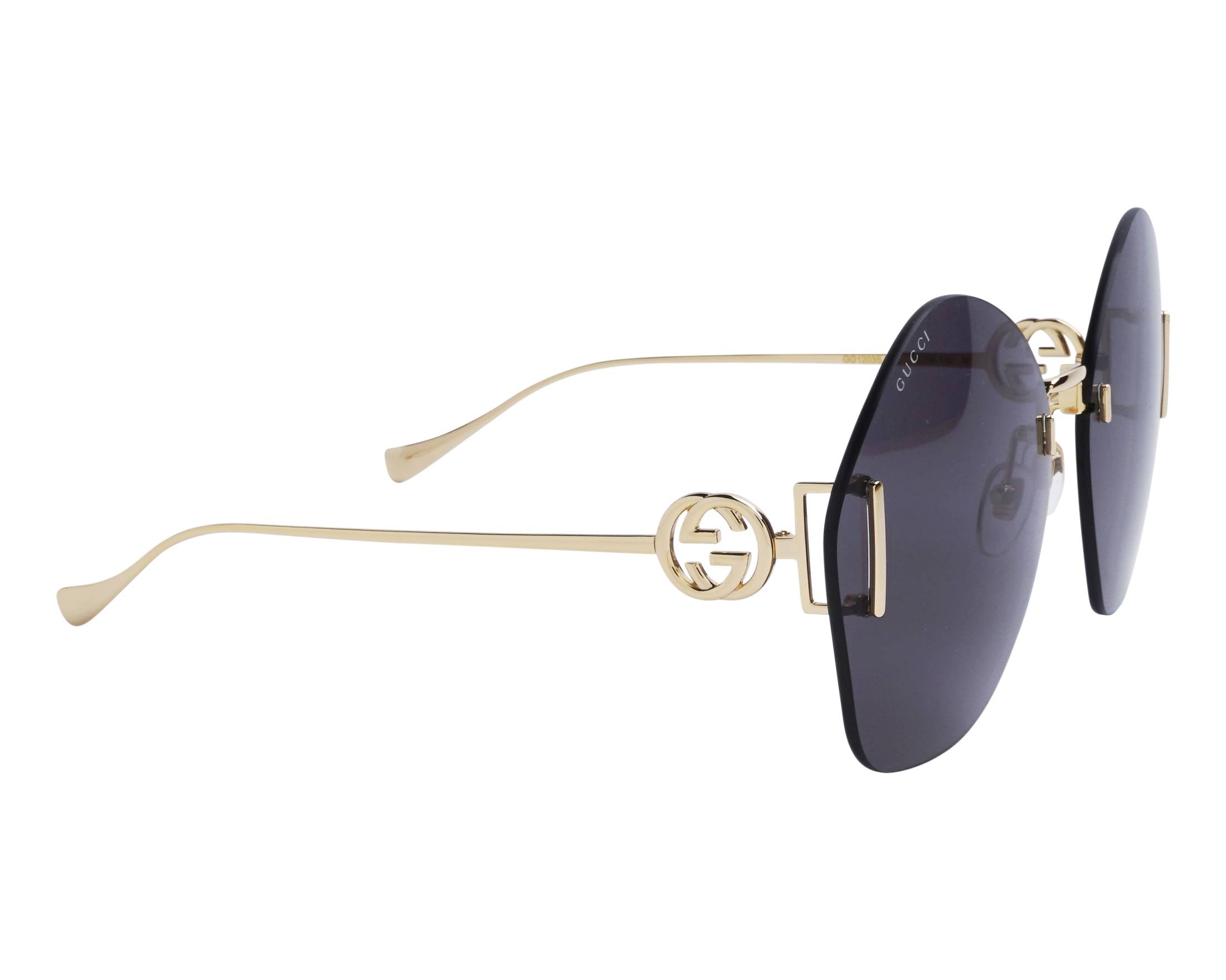 Gucci GG1203S 002 65-16 Gold  side view